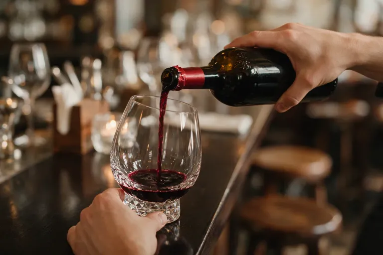 Red wine being poured