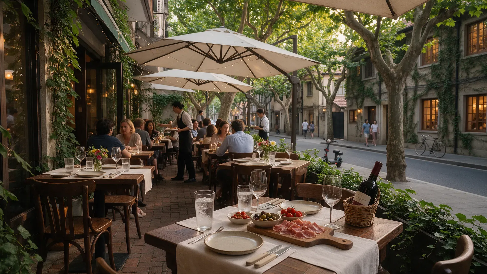 A restaurant terrace on a tree-lined street